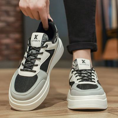 Basket noire à semelle épaisse pour homme, sneakers lifestyle avec design sobre, parfaite pour les tenues streetwear ou comme cadeau fête des pères