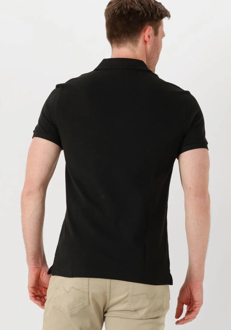 Polo homme Lacoste L1212 classique noir en coton piqué - IRMAJOHNS