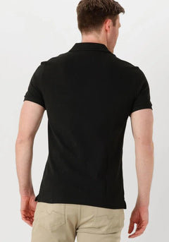 Polo homme Lacoste L1212 classique noir en coton piqué - IRMAJOHNS