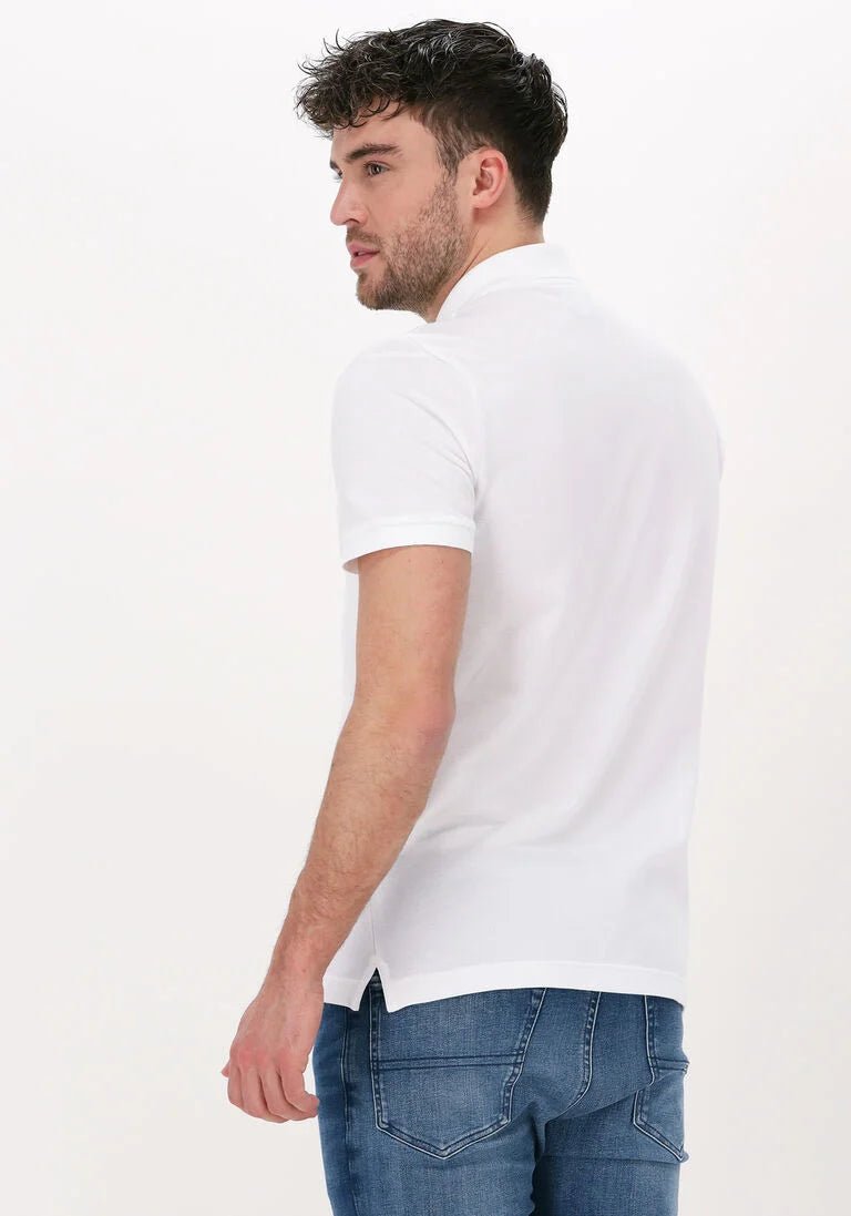 T-shirt polo homme inspiré du style Lacoste, confectionné en maille piquée avec finition élégante et col côtelé.