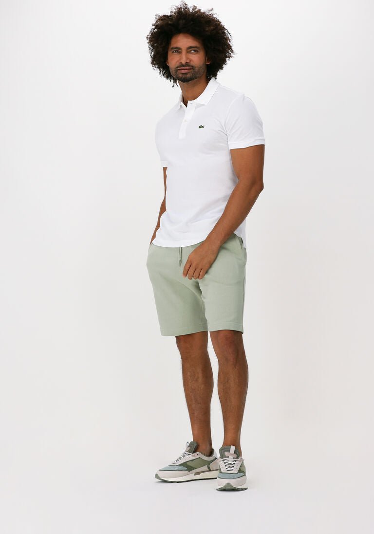 T-shirt homme coupe droite, en coton piqué respirant, style polo chic adapté aux saisons douces.