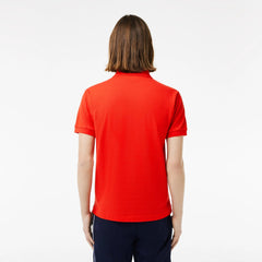 Polo classique rouge en coton, coupe droite pour homme, une alternative au pull polo et au tshirt chic dans une garde-robe moderne.


