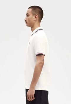 Polo blanc homme à manches courtes, pull polo en tricot doux, vêtement polyvalent alliant confort et élégance.

